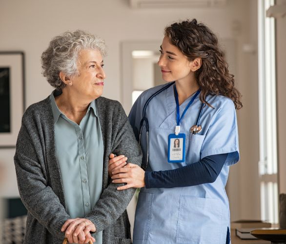 Elderly woman with nurse