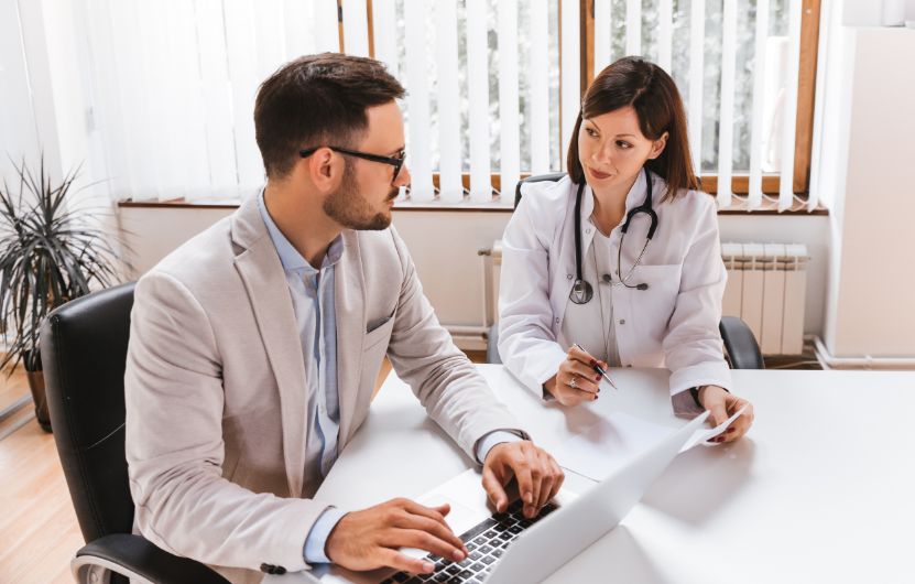 Two doctors discussing infusion therapy